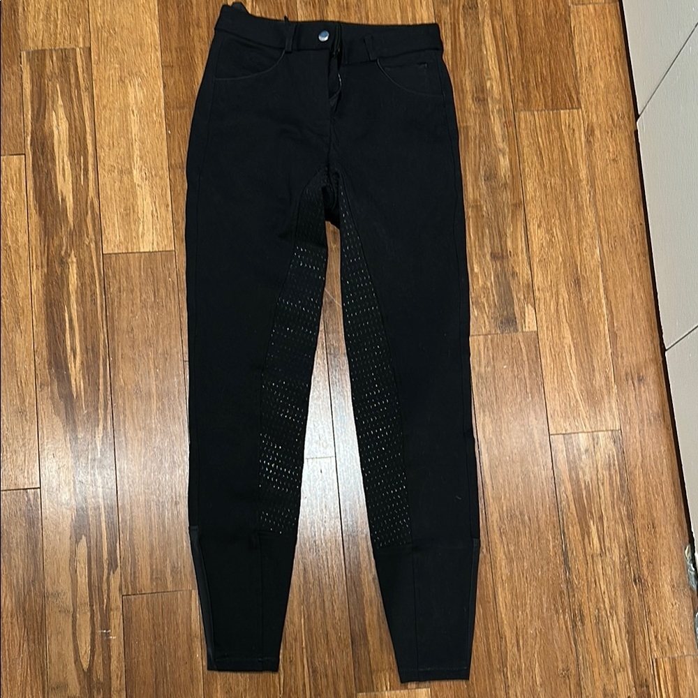 Black Skinny riding pants with grippy seat and inner thighs. Size 24